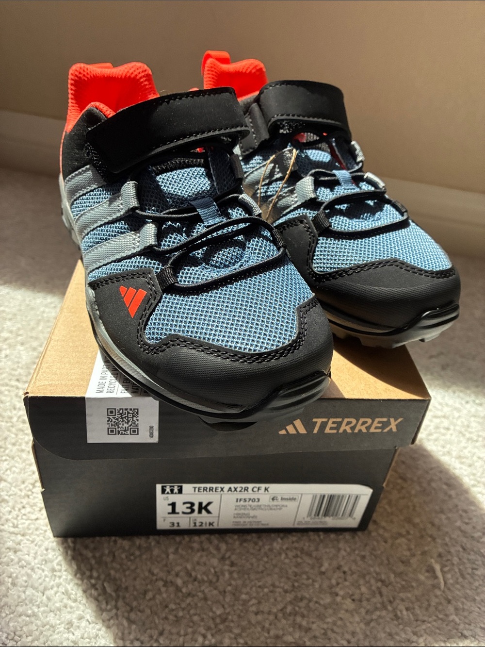 adidas Kids Blue and Black Trail Sneakers with Red-Orange Accent